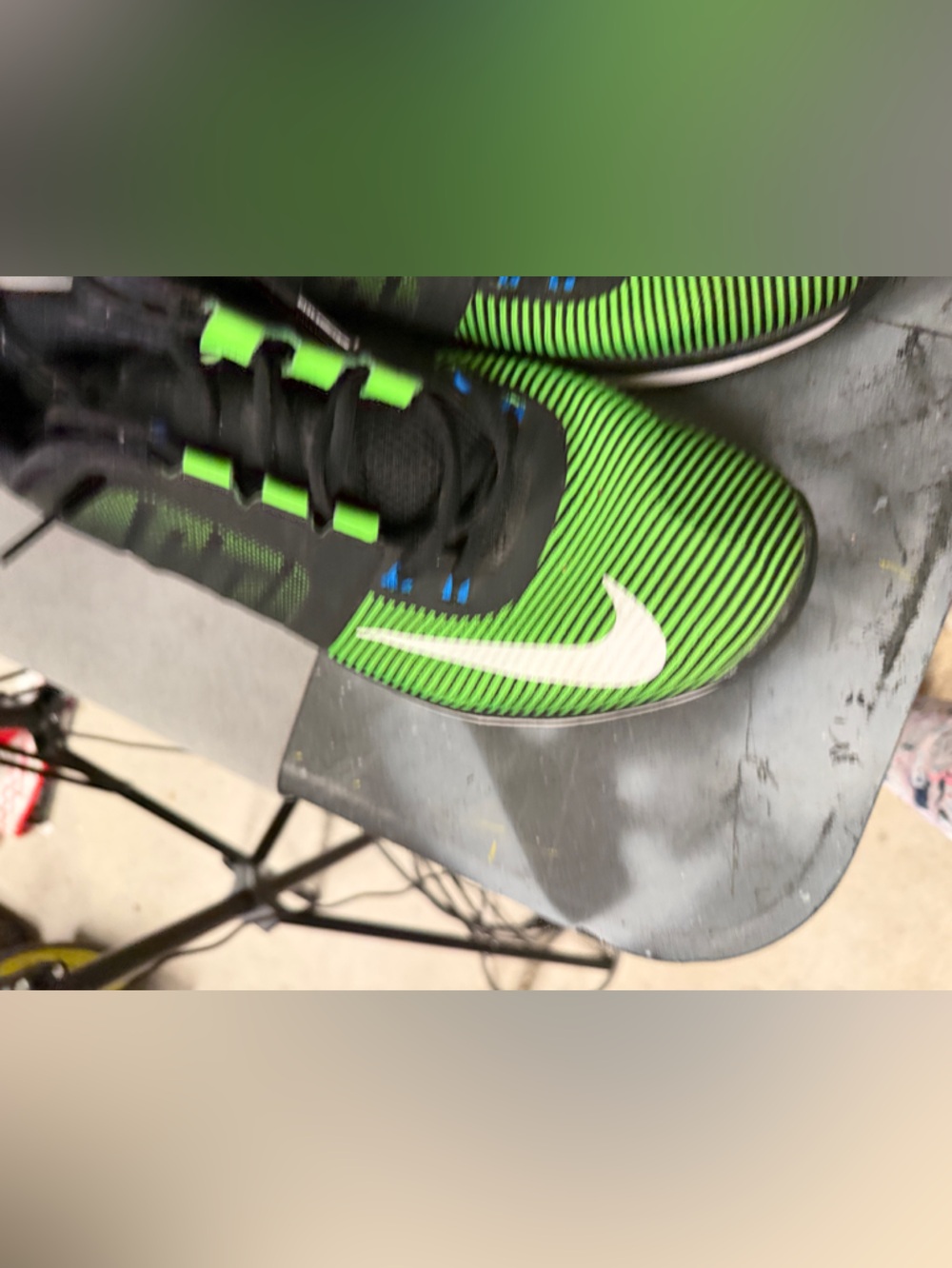 Nike Green and Black Soccer Cleats with White Swoosh